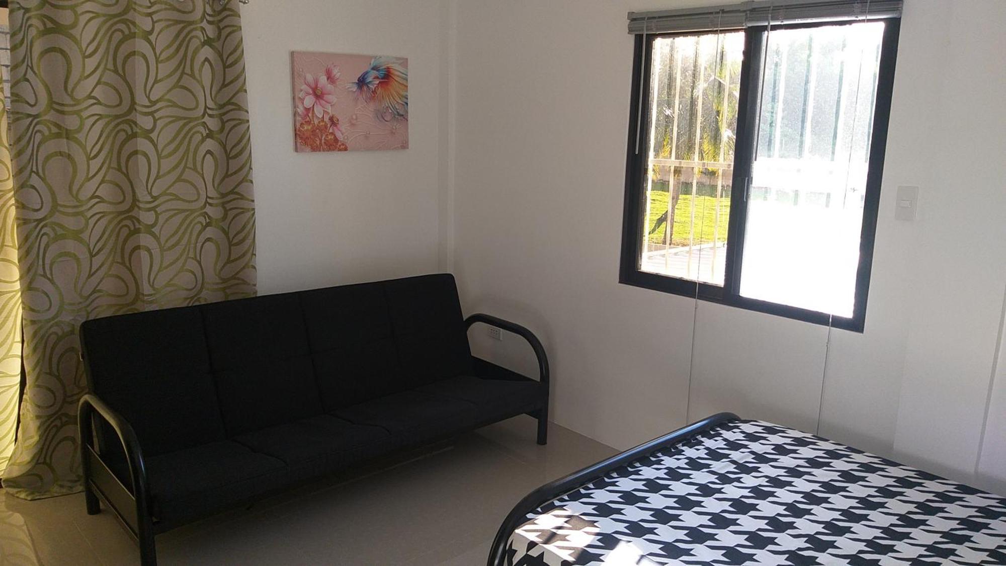 Ub Home Dauis Kamer foto